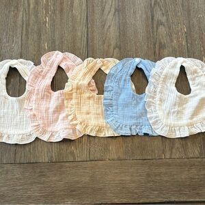 5 muslin ruffle bibs